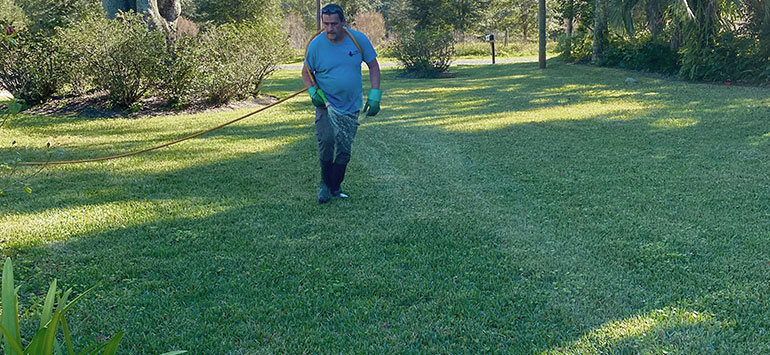 Driggers Tech Spraying Lawn